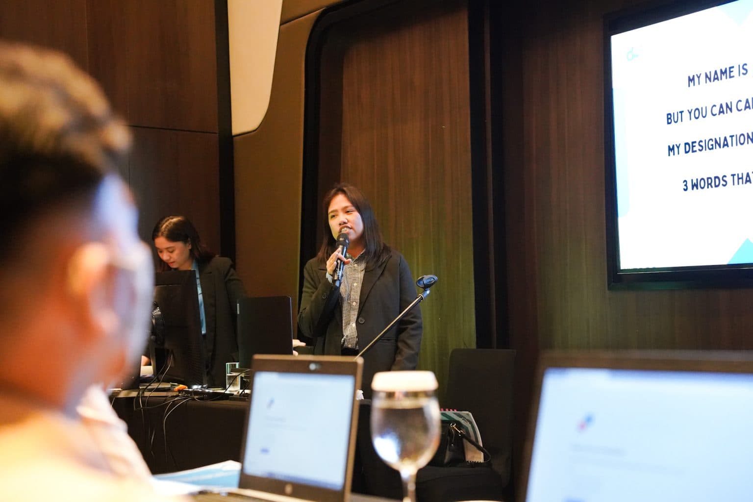 Trainers and attendees in an interactive session